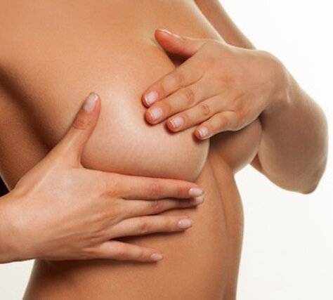 Папиллома на груди: симптомы появления, виды и способы лечения